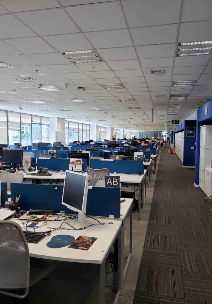 white and blue office rolling chairs